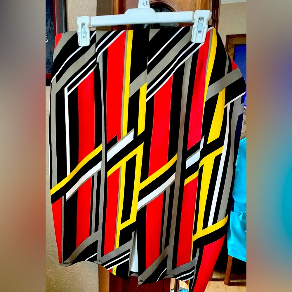 Multi-colored, geometric print pencil skirt, size XL. Fits more like a medium.